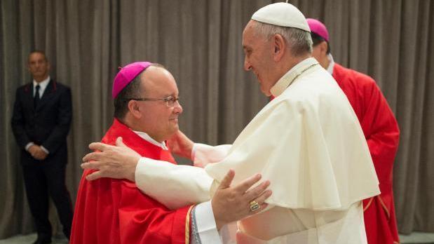 Archbishop Charles Scicluna of Malta greets Pope Francis